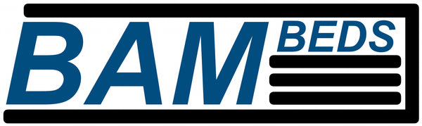 Logo showing bed platform stacked at the forward end of a camper shell, exhibiting the modular design of the bed. The logo has the word BAM in large font at the aft end of the camper shell