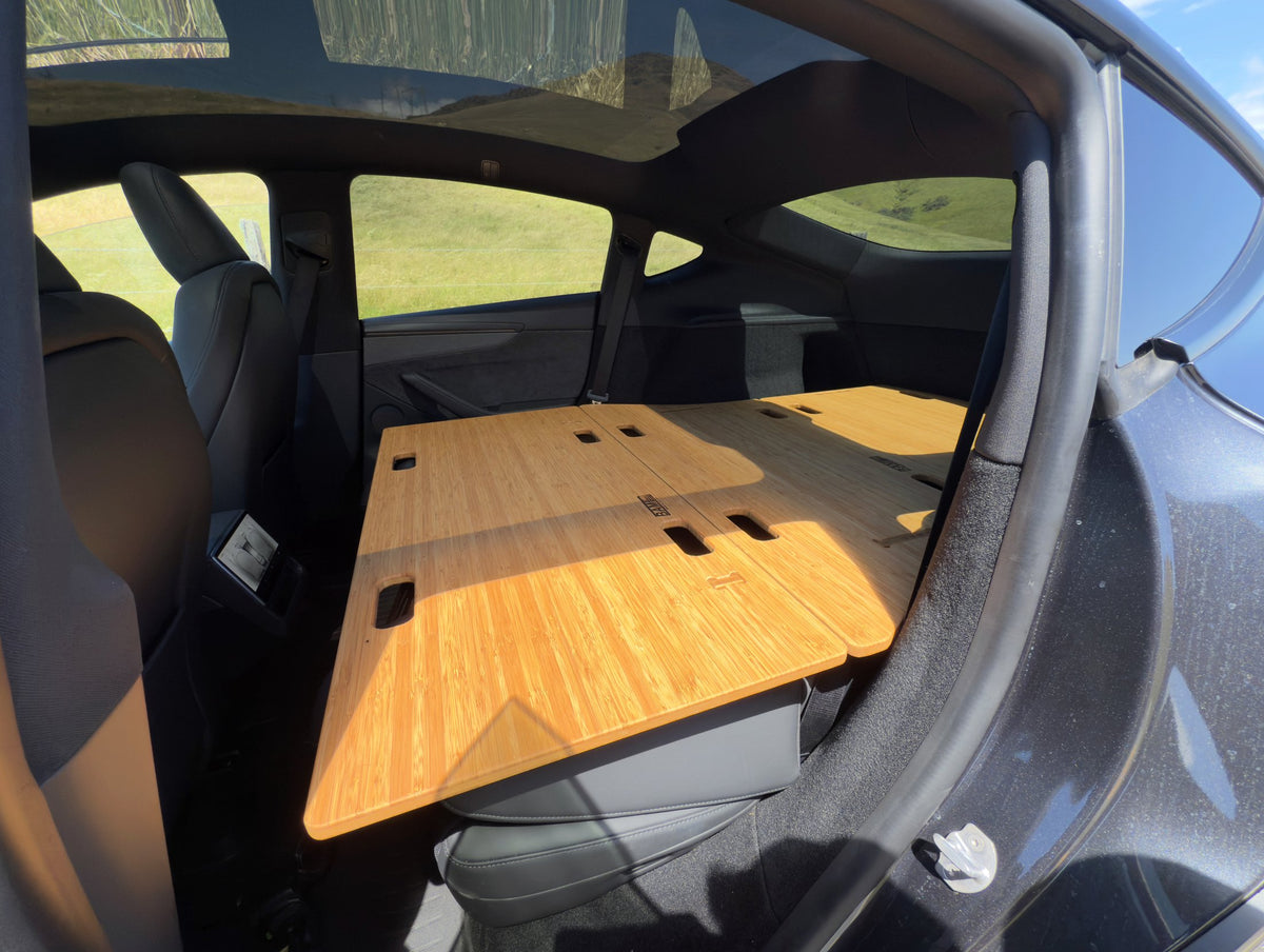 BamBeds bamboo leveling platform along Tesla Model Y cargo area