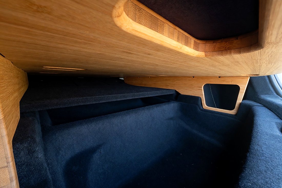 Storage under BamBeds bamboo leveling platform in Tesla Model Y